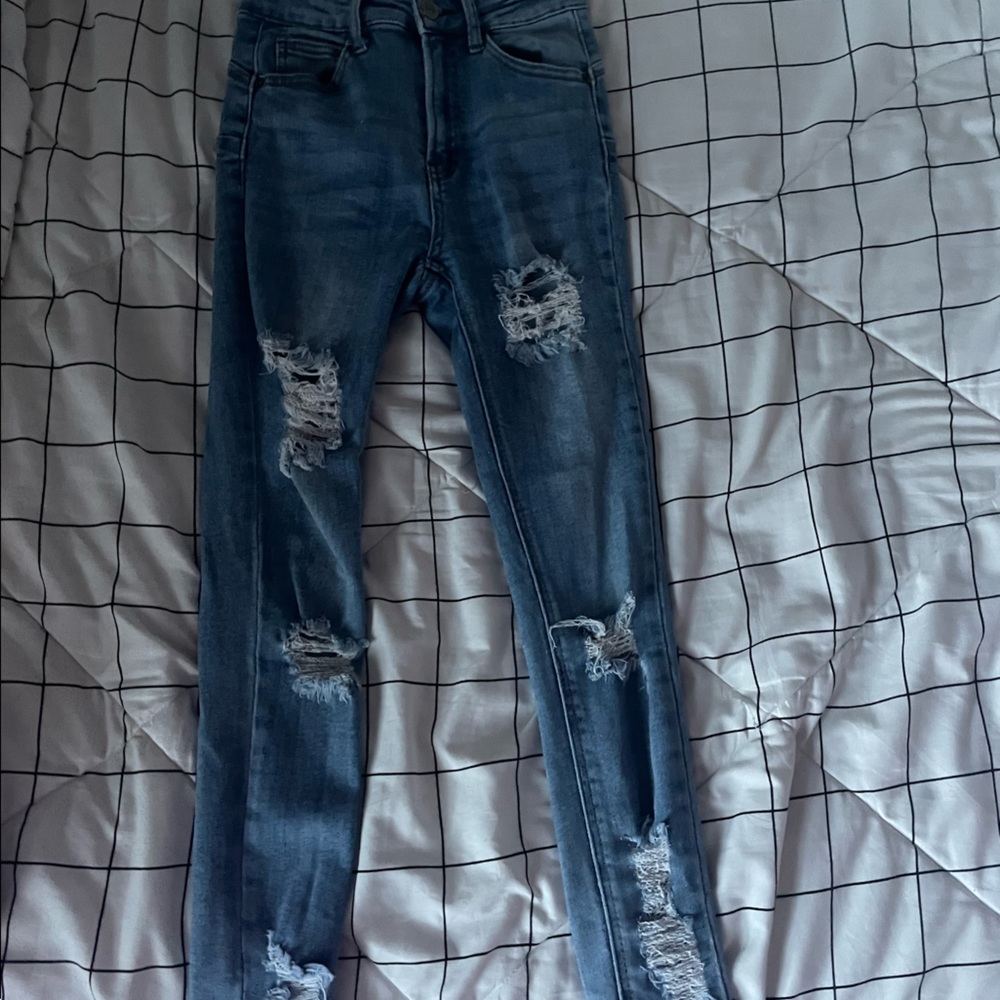 Wax jean light wash with holes size 0 low rise